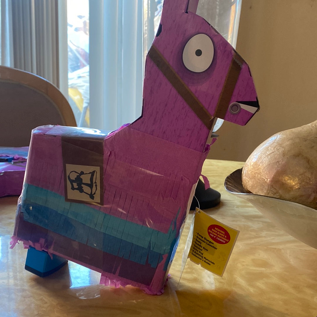 Jazwares Epic Games Fortnite Llama Drama Loot Piñata. Ages 8+. 23 Pieces Inside Missing I leg, Theres a dent and a couple holes