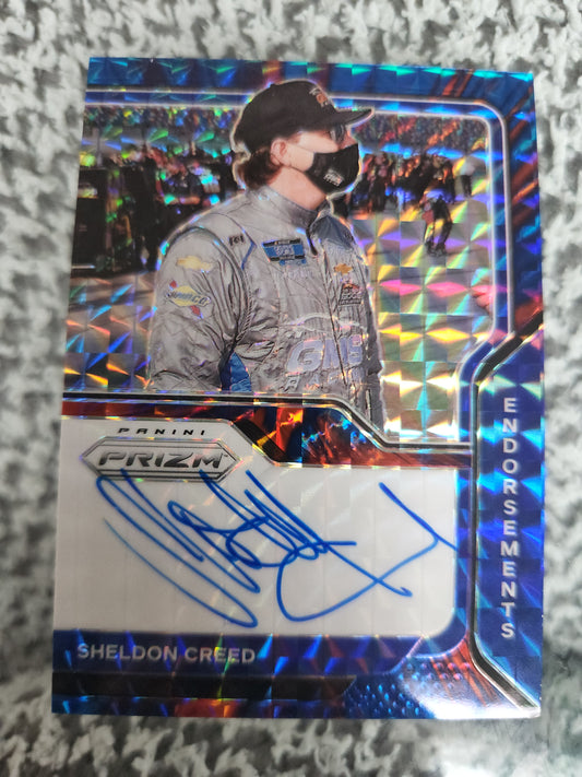 2021 Prizm Endorsements Auto Reactive Blue #E-SC Sheldon Creed 14/50