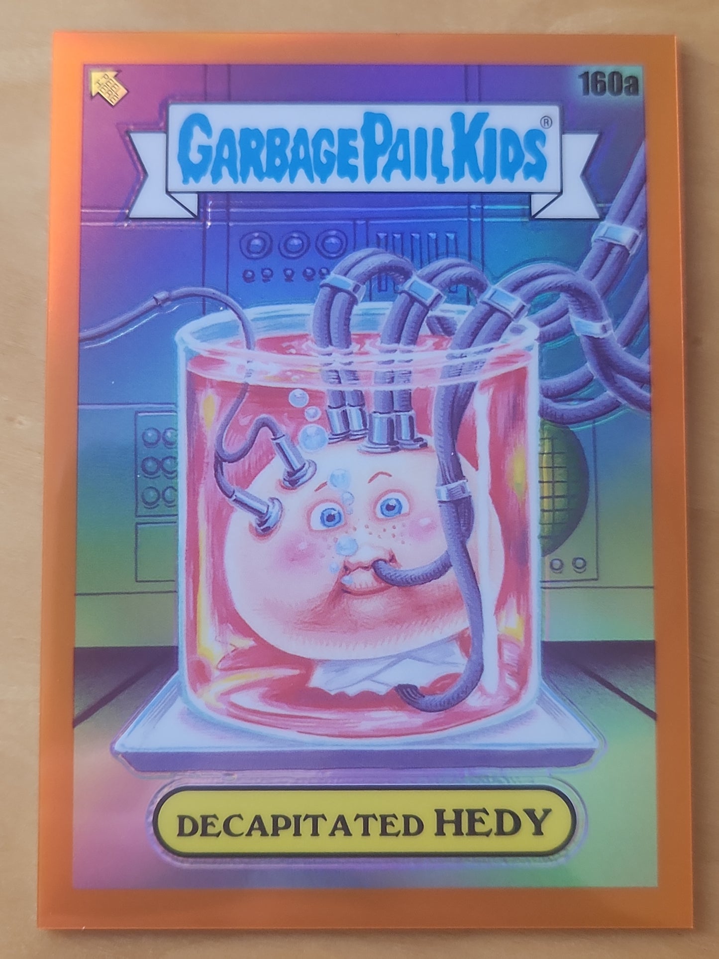 2021 Topps Chrome Garbage Pail Kids Decapitated Hedy #160a Orange Refractor 09/75