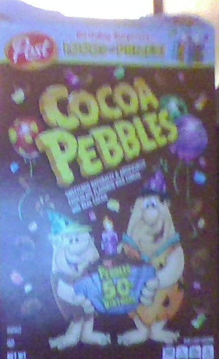 The 50th Birthday Coco Pebbles cereal box.