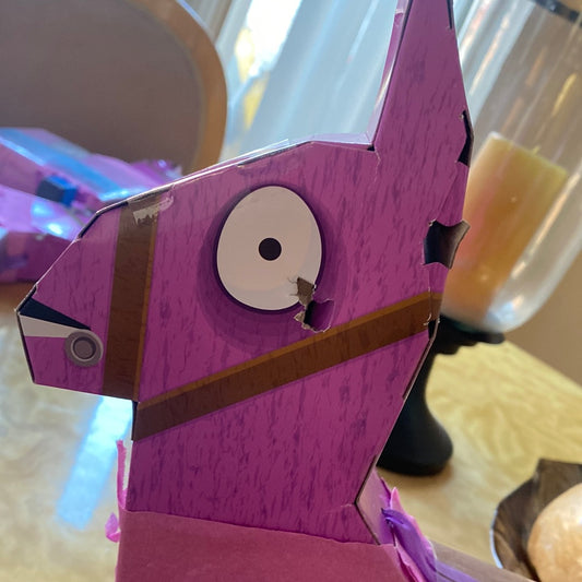 Jazwares Epic Games Fortnite Llama Drama Loot Piñata.  Ages 8+.   23 Pieces Inside Missing I leg, Theres a dent and a couple holes